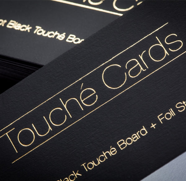 Touché black business cards with traditional hot foil stamping