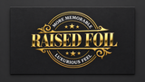 Smooth raised gold foil lettering and circular details on a black suede soft touch business card